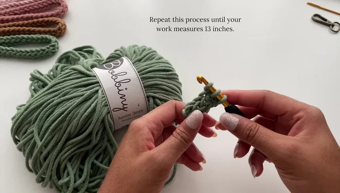 Continue crocheting until the i-cord reaches 13 inches.