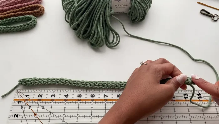 Remove hook, trim cord, leaving 5 inches. Attach lobster clasp.