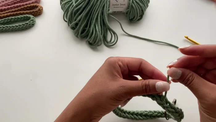 Tie the remaining tails in a double knot for security.