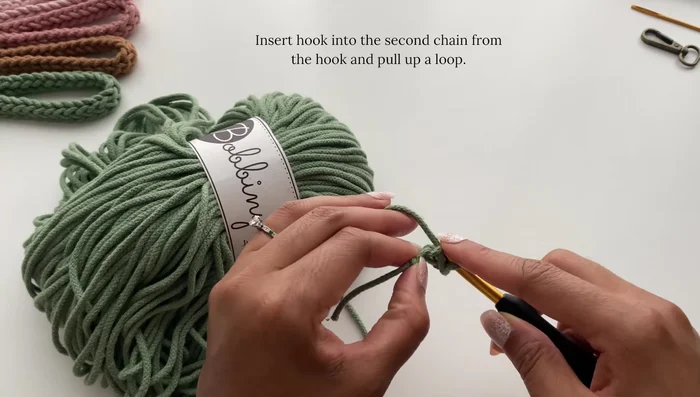 Continue crocheting until the i-cord reaches 13 inches.