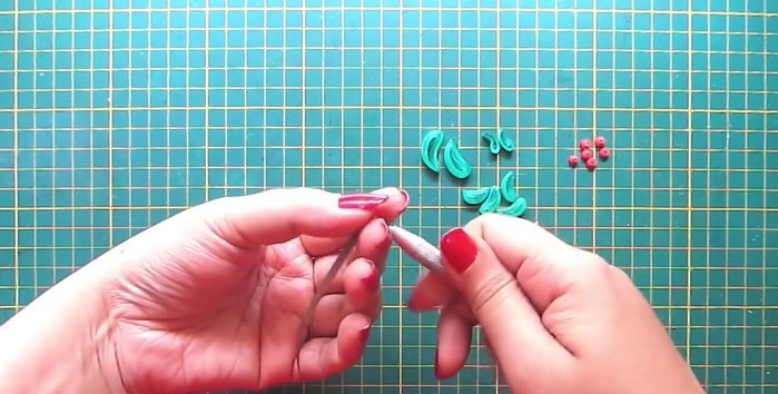 Create the tree trunk: Make a triangle shape with a dark brown strip.