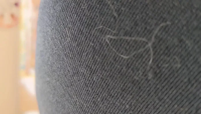 Sketch out abstract shapes on the wet background using a white water-soluble wax pastel.