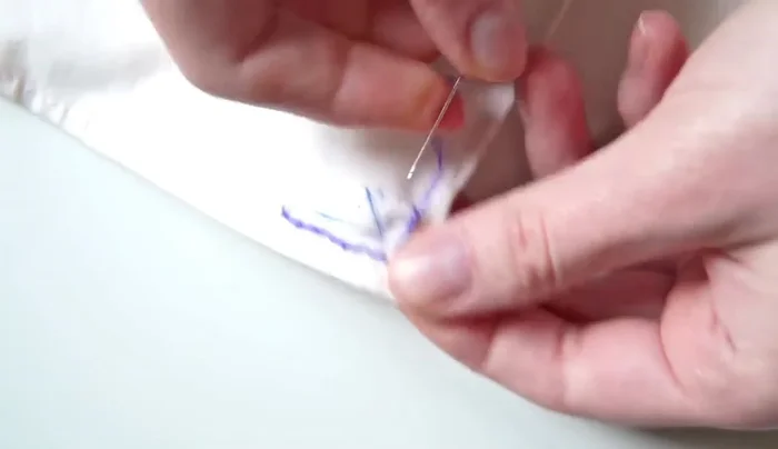 Use a stamp stitch to embroider the pattern.