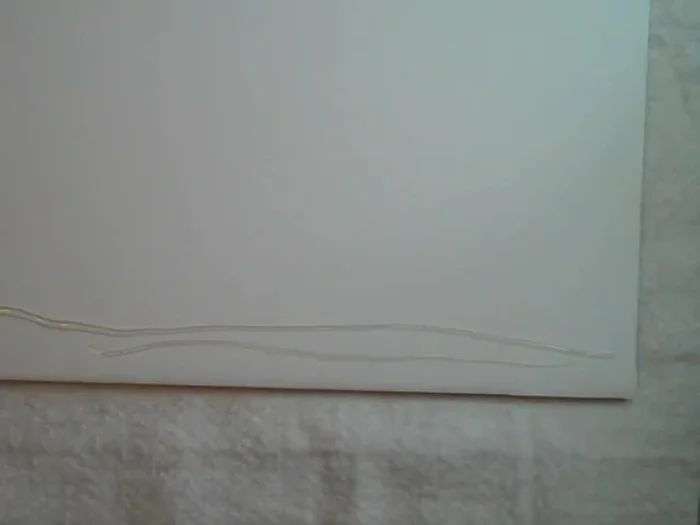 Glue the batting to the back of the foam core board.