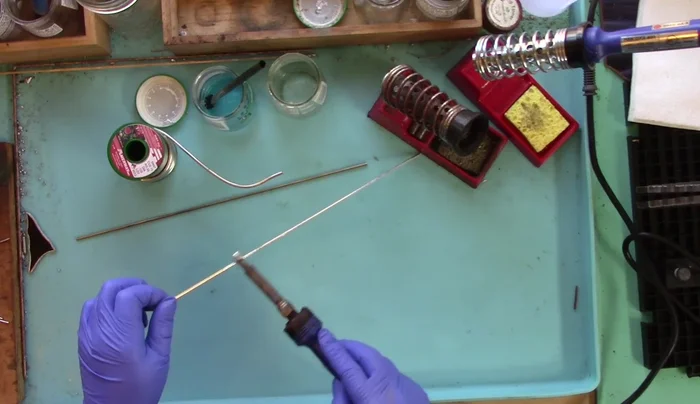 Give a final twist as the wire cools to ensure a secure bond.