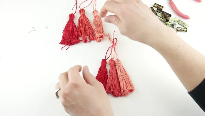 Trim and even out tassels: Lay all tassels together and trim them to an even length. Fluff up the tassels for a fuller look.