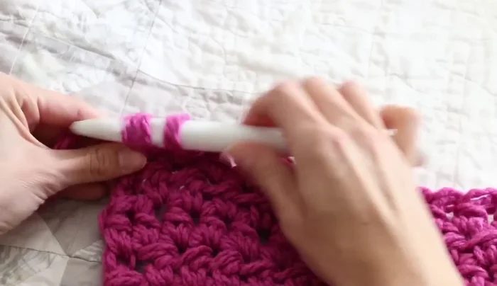 To finish, complete your final row of half double crochets. Yarn over and pull the tails through the loop on your hook. Secure tightly and weave in the ends.