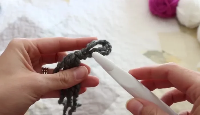 Make a slip knot and chain 70 stitches (approximately 50 inches with the specified yarn and hook).