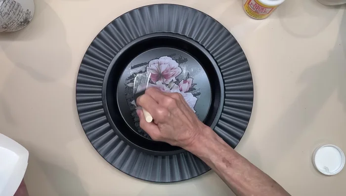 Attach the pie plate to the Dollar Tree charger.