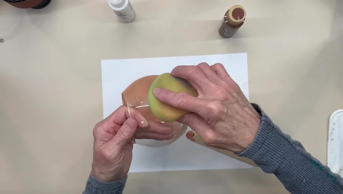 Paint the vases and saucers using a sponge for even coverage. Apply two coats.