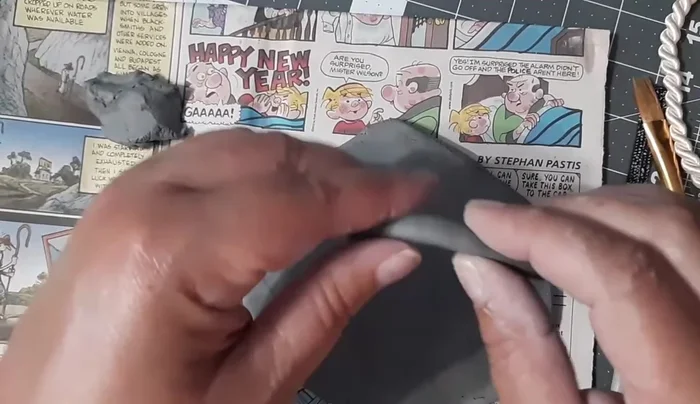 Pinch the inside of the U-shape to create a slight overhang.