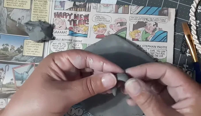 Pinch the inside of the U-shape to create a slight overhang.