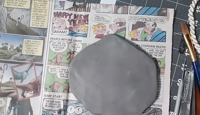 Pinch the inside of the U-shape to create a slight overhang.