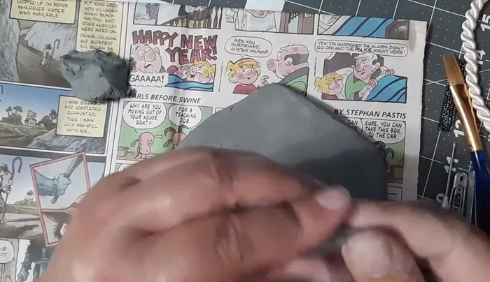 Pinch the inside of the U-shape to create a slight overhang.