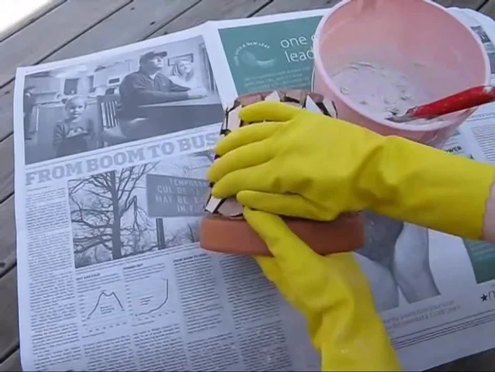 Apply the grout, forcing it into the grout lines using an up-and-down and side-to-side motion to fill the lines completely.