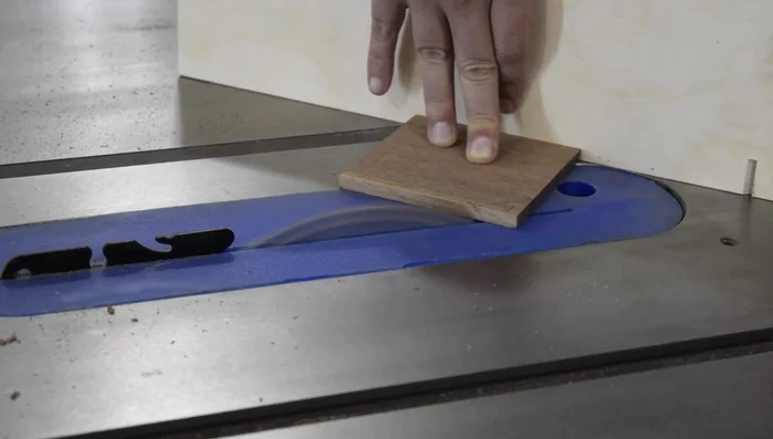 Glue a stop block to the holder.