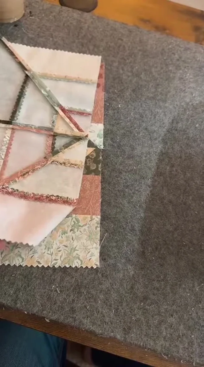 Sew blocks together in rows, matching seams. Then sew rows together to form the quilt top. Trim to final size (11 1/2" x 11 1/2" blocks for a 4x4 baby quilt).