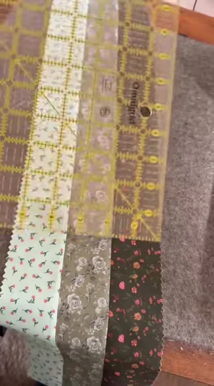 Cut sewn strips into squares (e.g., 6 1/2" x 6 1/2"). Keep leftover fabric for future projects.
