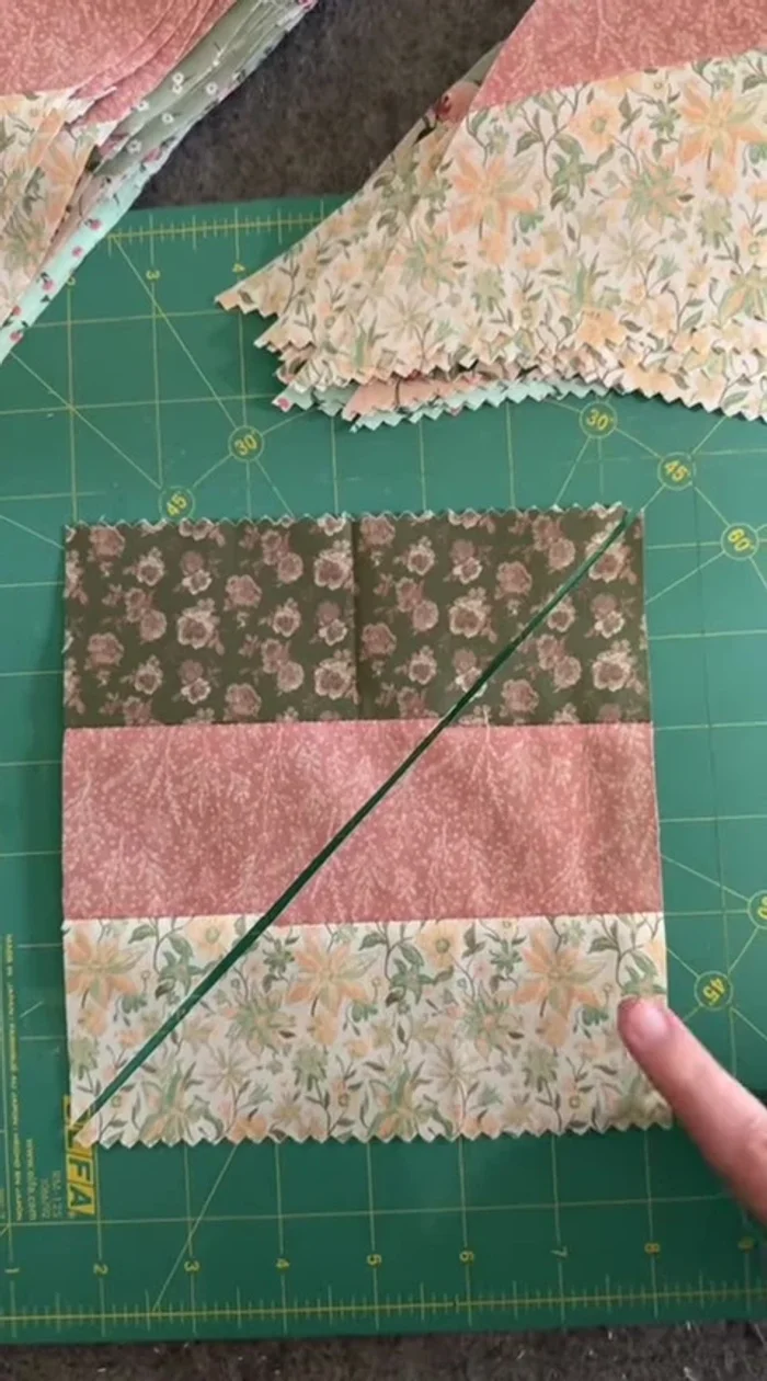 Arrange squares: darks at top, lights at bottom. Cut half the squares off to the right, half to the left.