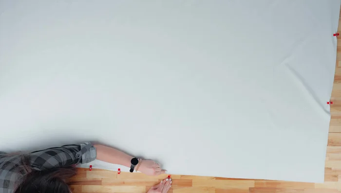 Repeat cutting process for the blackout liner fabric, but use clips instead of pins for blackout materials.