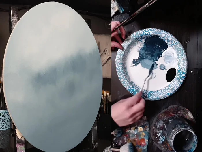 Add white paint below the blue foreground trees, blending upwards into the wet blue paint using a clean, dry mop brush (working in sections for optimal drying and blending).