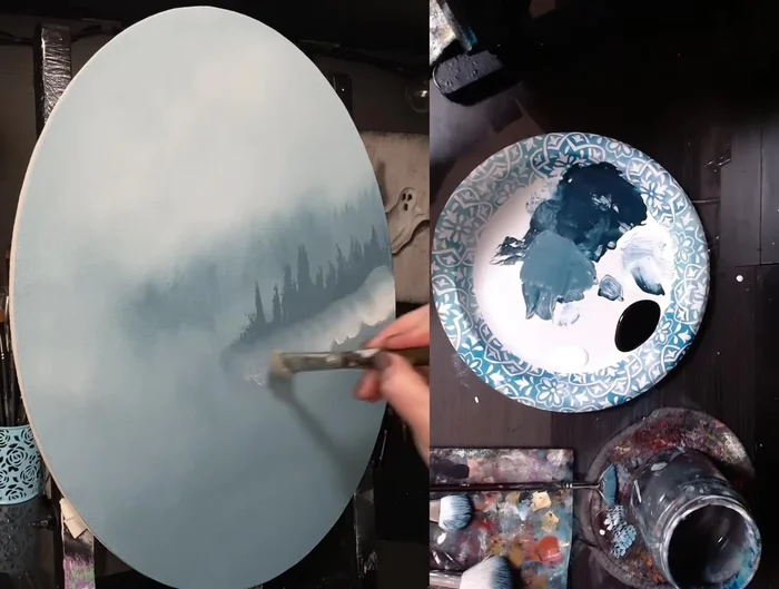 Add white paint below the blue foreground trees, blending upwards into the wet blue paint using a clean, dry mop brush (working in sections for optimal drying and blending).