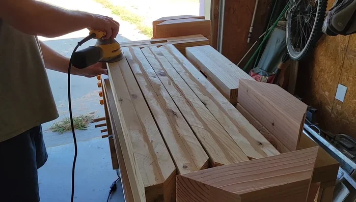 Stain the table base components.