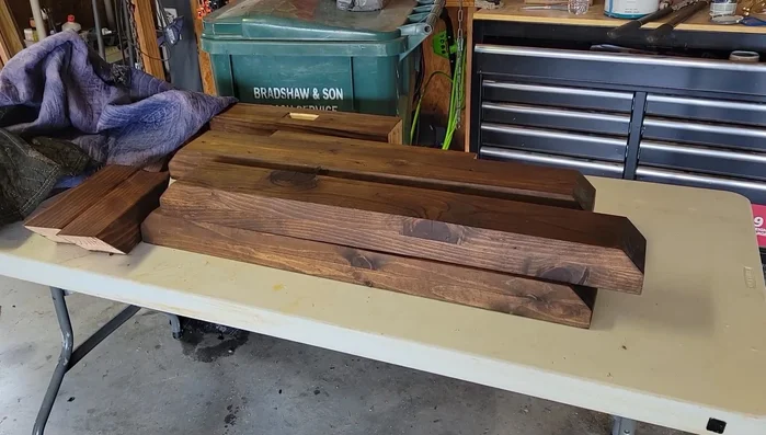 Stain the table base components.