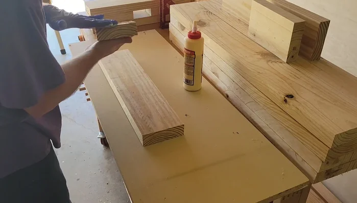 Cut decorative angles for the feet and table top supports.