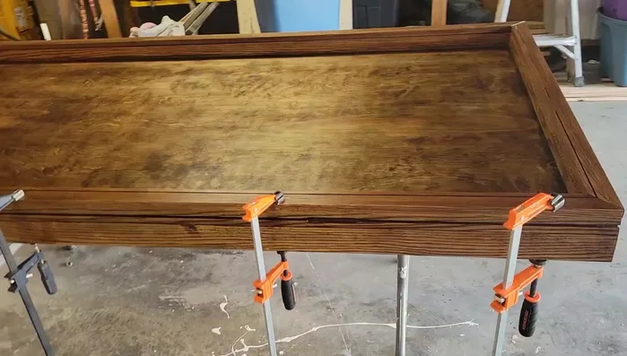 Glue armrests to the table.