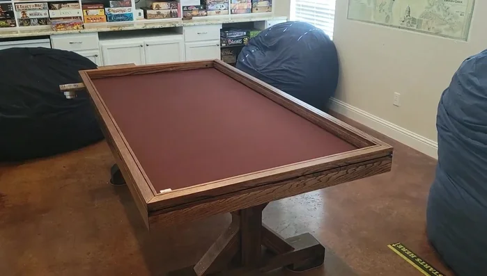 Cut and attach the removable tabletop leaves that go over the gaming well. Add dowels to hold the leaves together.