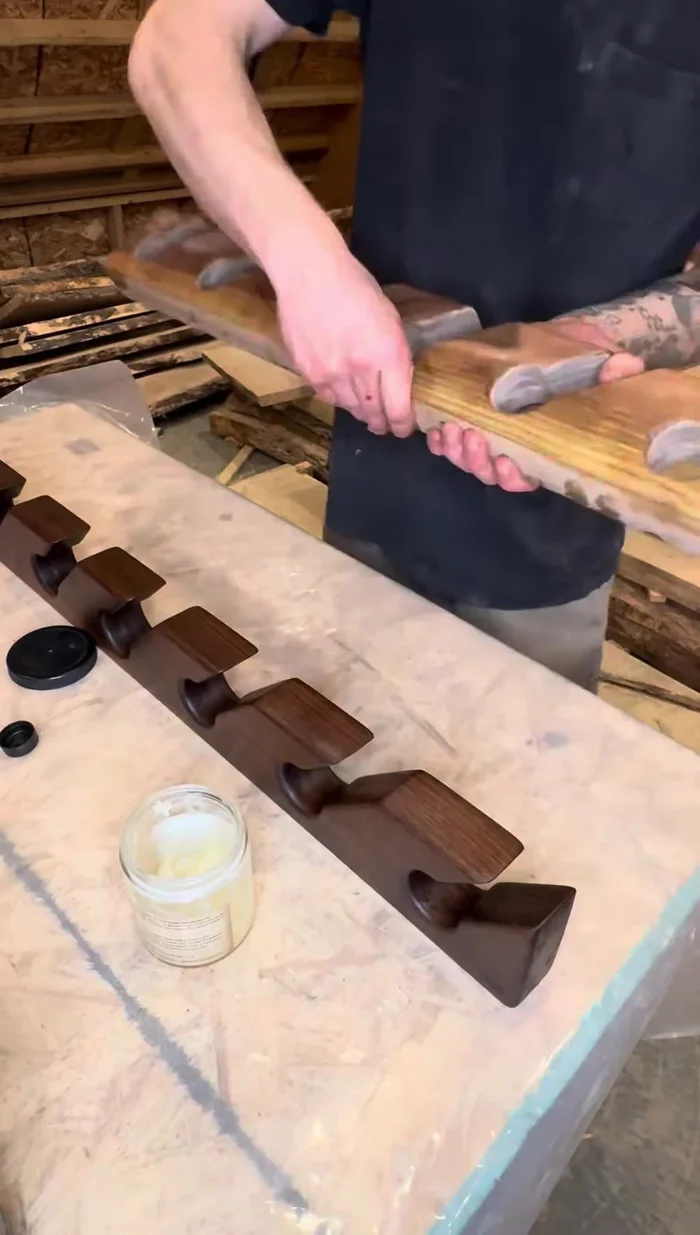 Apply beeswax finish by hand and buff with paper.