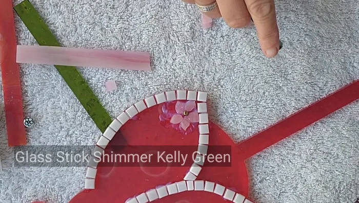 Add small cubes as centers for the flowers.