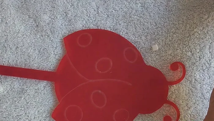 Apply multi-purpose glue sparingly to the base, ensuring it's thin enough to seat between tiles.