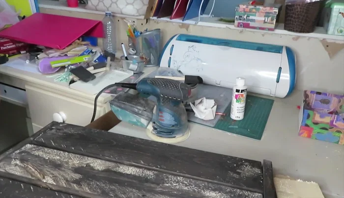 Paint the mailbox using a water-based paint marker.