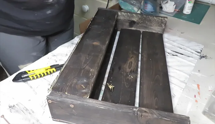 Paint the mailbox using a water-based paint marker.