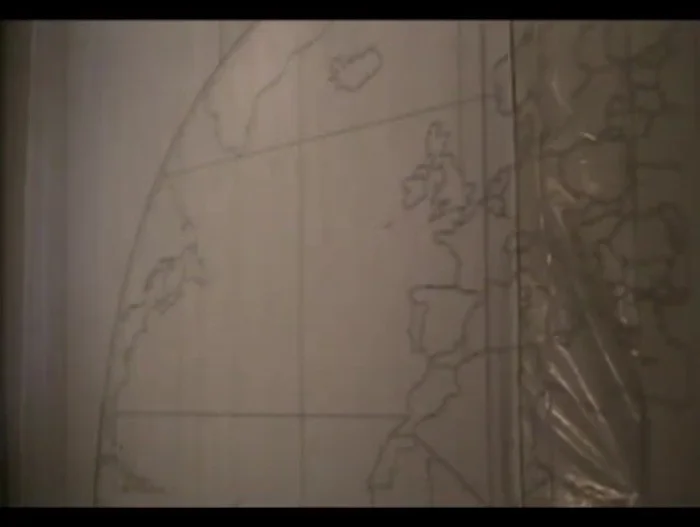 Outline the projected map onto the sheet using a black permanent marker. Adjust detail level to your preference.