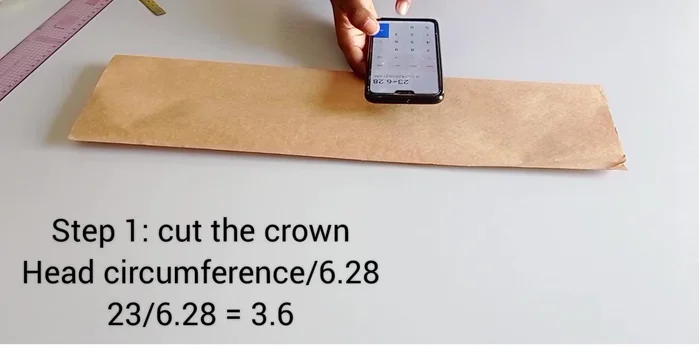 Draft the brim pattern: Divide the head circumference by 3.142. Measure this radius, add a desired height (3 inches used in the tutorial), and add seam allowance (½ inch to the top, full allowance to the bottom). Cut out.