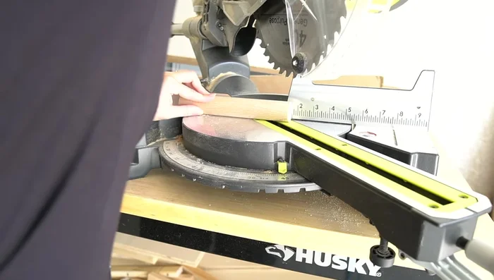 Sand the wood hooks for smoothness.