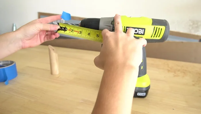 Sand the wood hooks for smoothness.