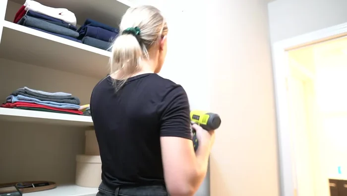 Drill a 5/8 inch hole in the wall where you want to place the hook.