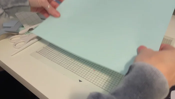 Apply transfer tape to the weeded vinyl, carefully aligning and pressing to adhere.