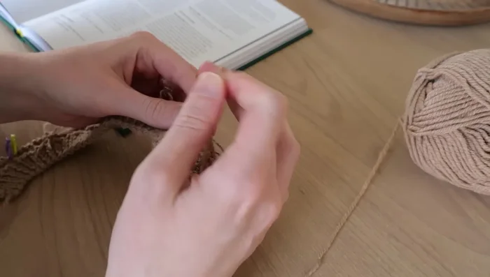 Count stitches regularly to ensure accuracy, especially before moving on to different sections (yoke, body, sleeves).