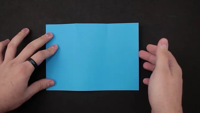 Repeat step 3 on the other side (bring the left side to the right).