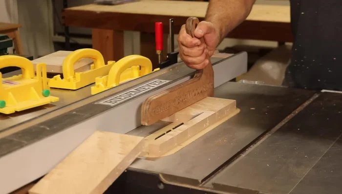 Cut the box sides to final width using a table saw.