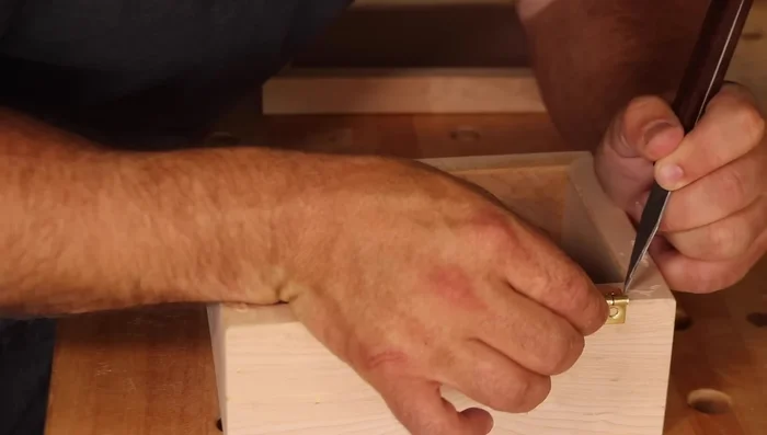 Install the hinges using CA glue and screws.