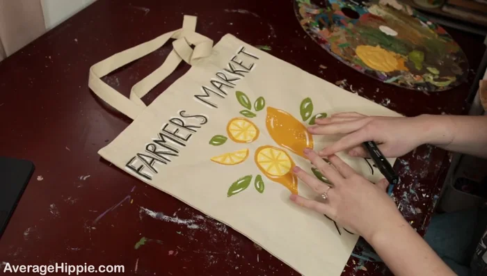 Add final details. Use a fine-tip marker to add smaller details to enhance the design.