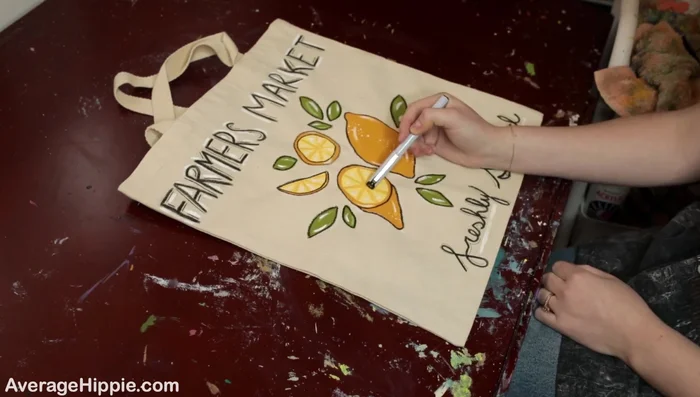 Add final details. Use a fine-tip marker to add smaller details to enhance the design.