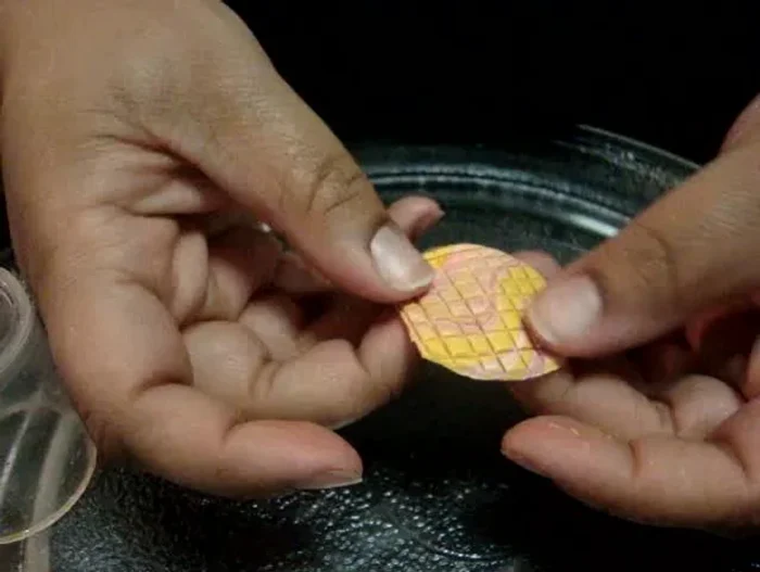 Bake the clay according to the manufacturer's instructions.