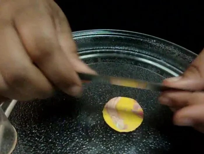 Bake the clay according to the manufacturer's instructions.